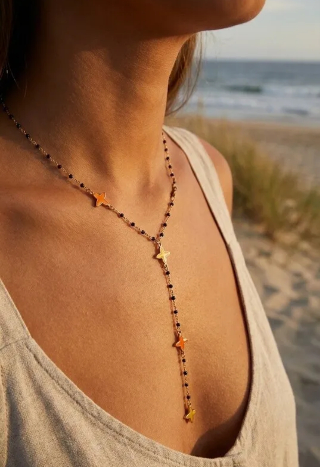 Screenshot_2026-04-15-18-04-11-794_com.efolix.MicroStore.purchaser-edit collier acier inoxydable doré femme Style Chic
